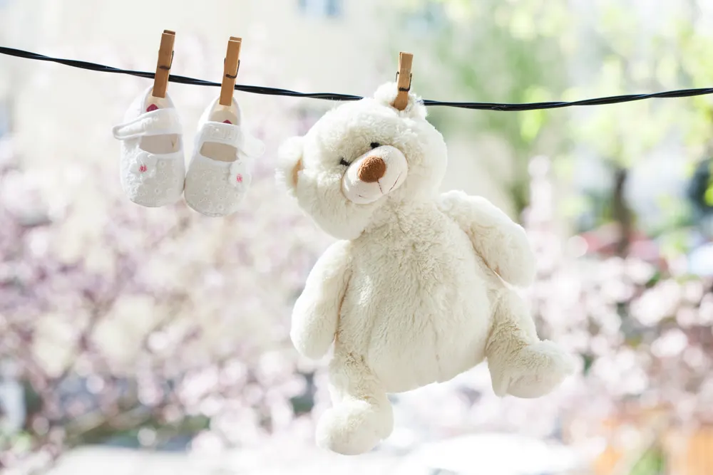 baby-clothes-hanging-on-the-clothesline-2025-04-01-16-49-34-utc